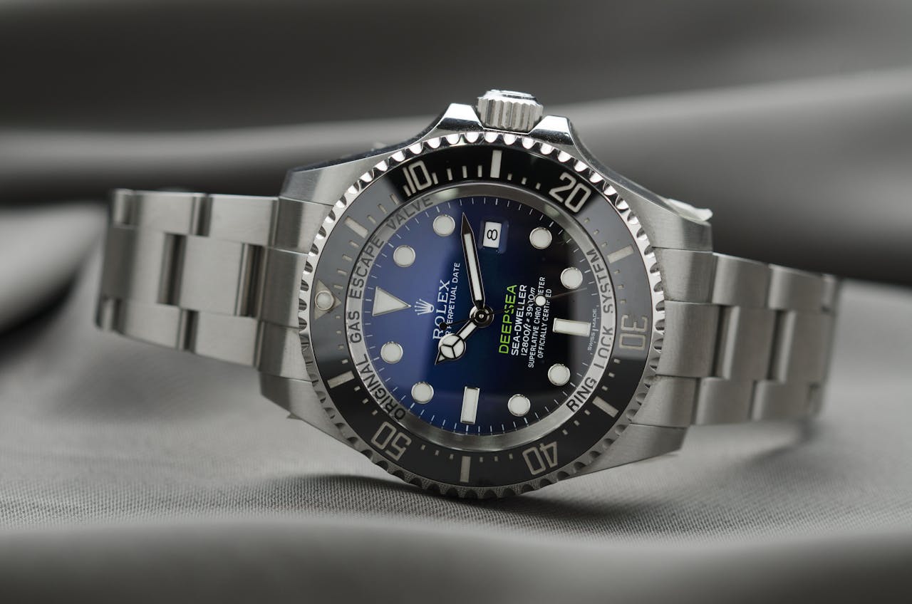 About High-end Rolex wristwatch showcasing precision engineering and luxury design.